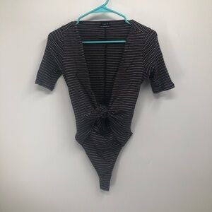 Out from under women’s bodysuit‎ low, cut ties by the waist Size small petite